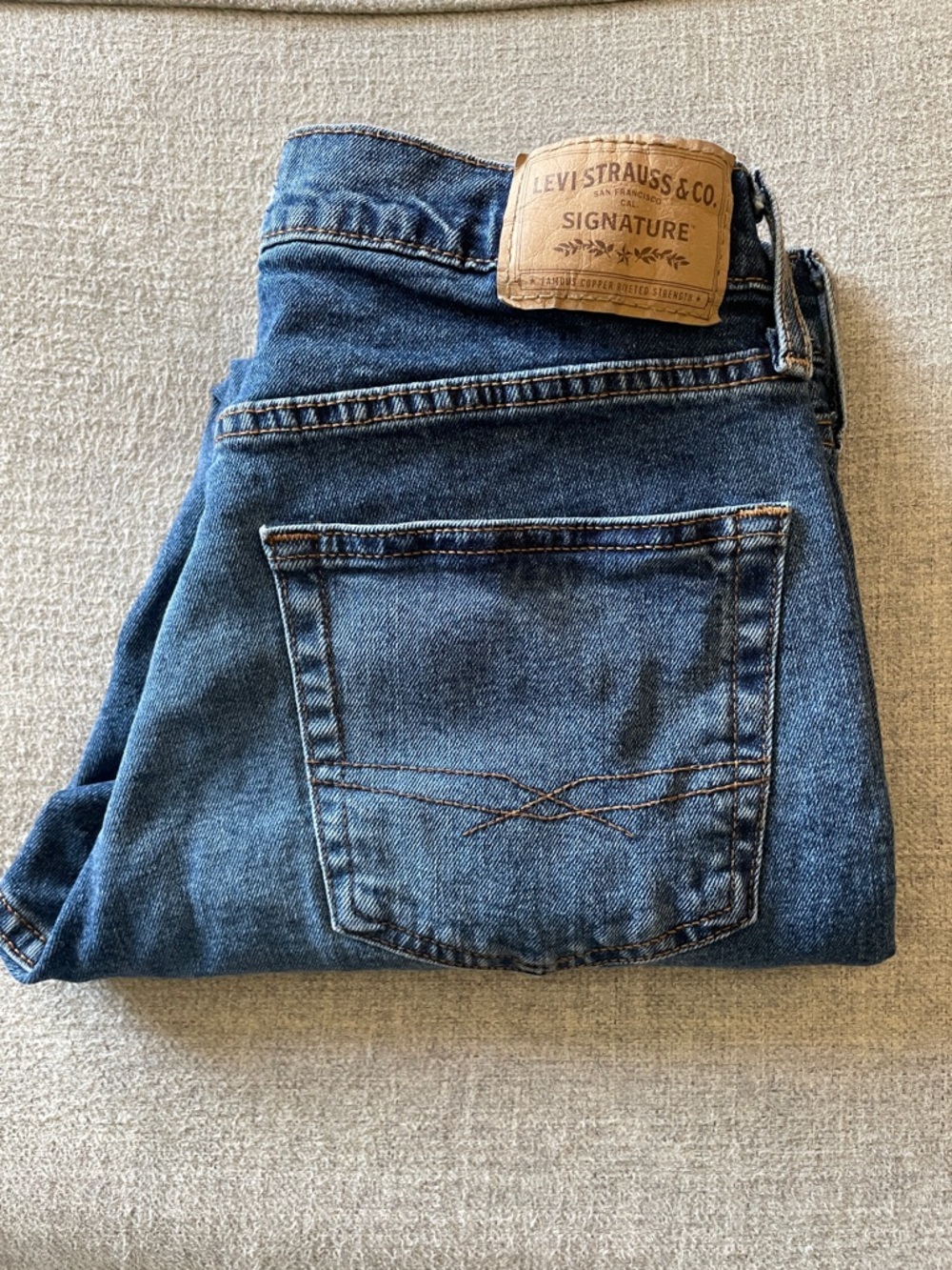 Levi's Men's Blue Relaxed Jeans with Tan Patch